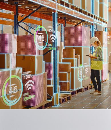 A worker looks at shelves in a large retail warehouse