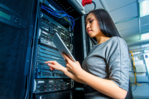 women working on new technology using tablet