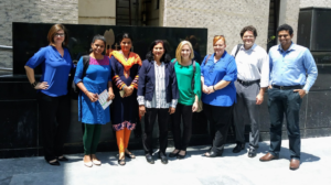 Pictured left to right: Brandy Semore, Yamini Krishnan, Ravindra Talwadker, Naveena Swamy, Katie Roberts, Anna Vakulick, Jeff Moore, Zee Nawaz.